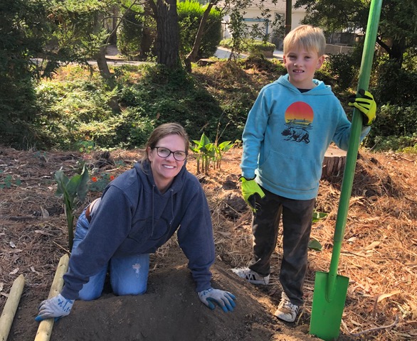 Adult and Child with Shovel